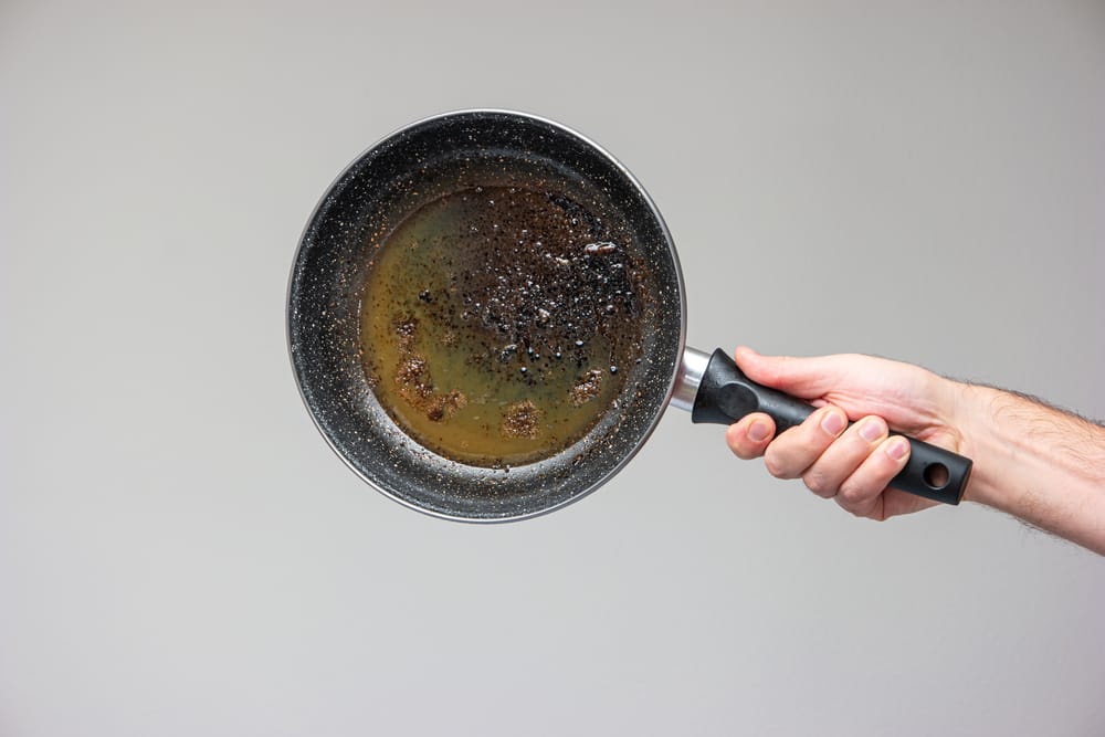 How To Clean Burnt Pots & Pans Ways to Clean a Scorched Pan The Maids
