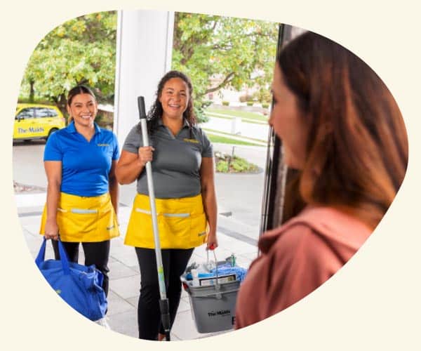 Maids cleaning a client's house