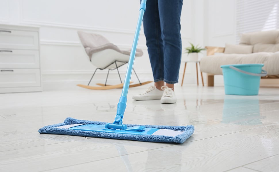 Person mopping living room